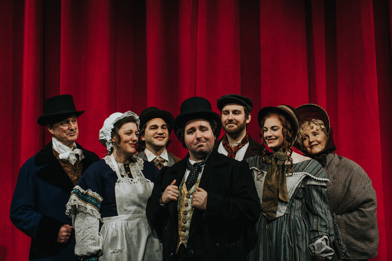 a charles dickens christmas cast photo