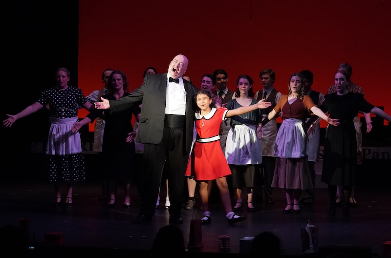 Annie and Daddy Warbucks sing together
